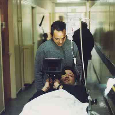 Giorgos Argyroiliopoulos on a stretcher pushed by Aris Shinohoritis, a fine grip.